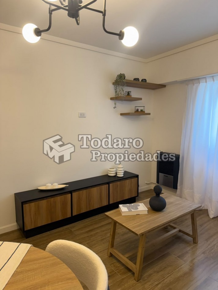Venta departamento tres ambientes, zona centro. Reciclado y amoblado